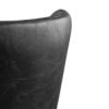 luxe black leather chair back corner