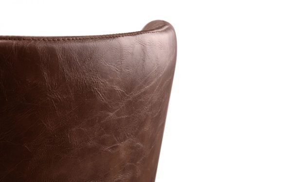 luxe brown leather chair back corner